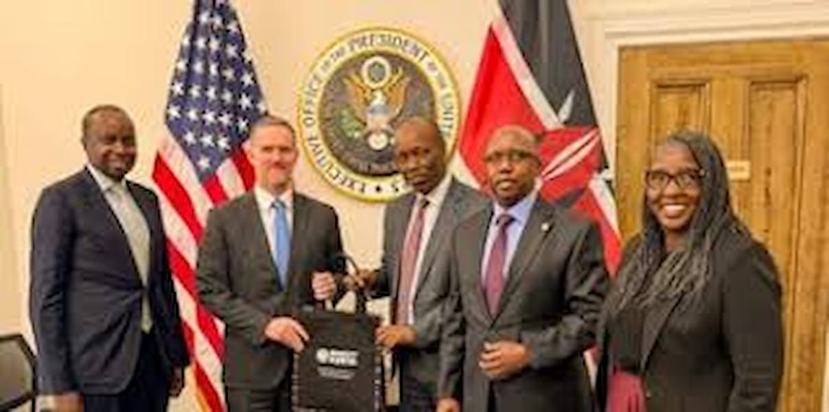 Kenya Trade Deal: Kenyan officials negotiating a trade deal with US representatives in an office