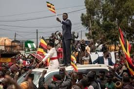 Uganda politics rally showing crowds and national flags